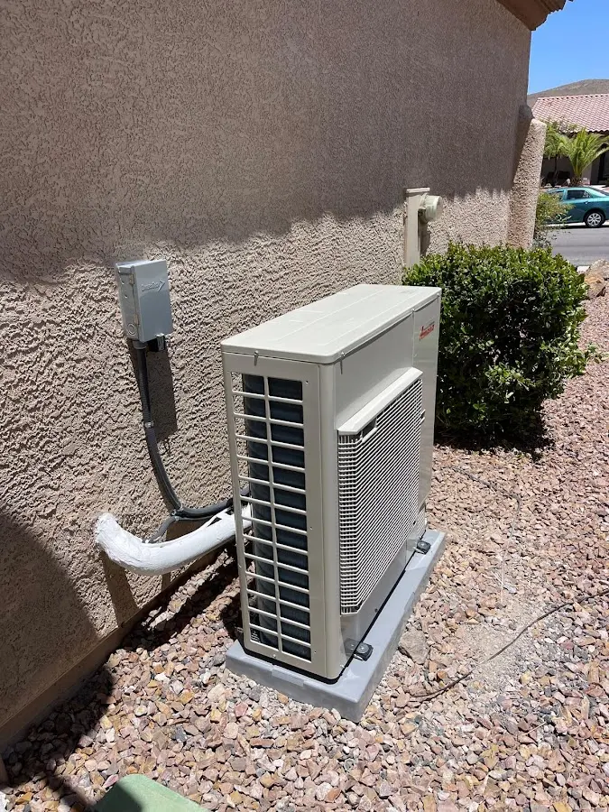 Residential air conditioning condenser unit in Sayre
